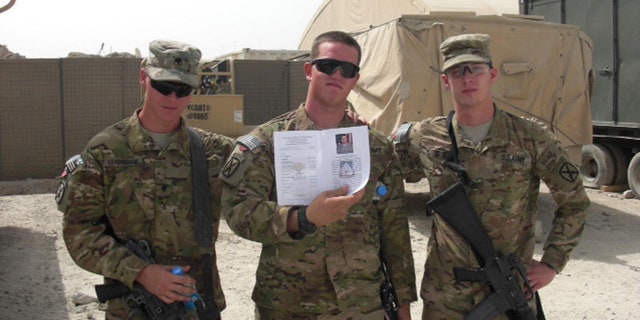 James (right) poses for photo at memorial service for SPC Douglas J. Jeffries Jr.