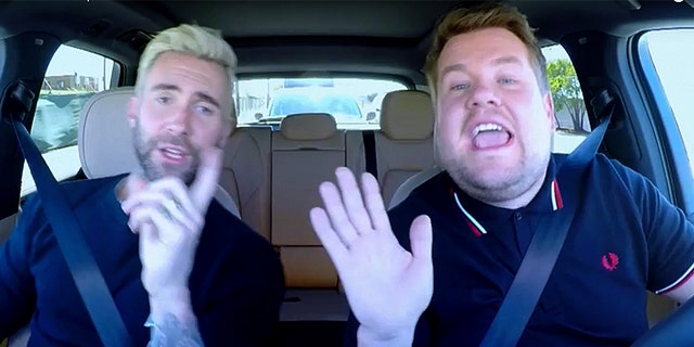James Corden (right) and "Carpool Karaoke" guest Adam Levine encountered some trouble with the law in the new episode of the TV host's singing car show.