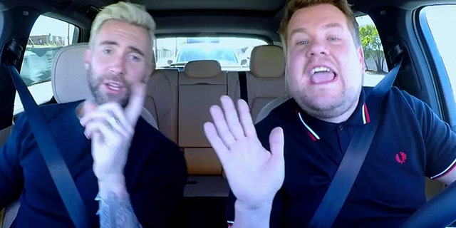 James Corden (right) and "Carpool Karaoke" guest Adam Levine encountered some trouble with the law in the new episode of the TV host's singing car show.