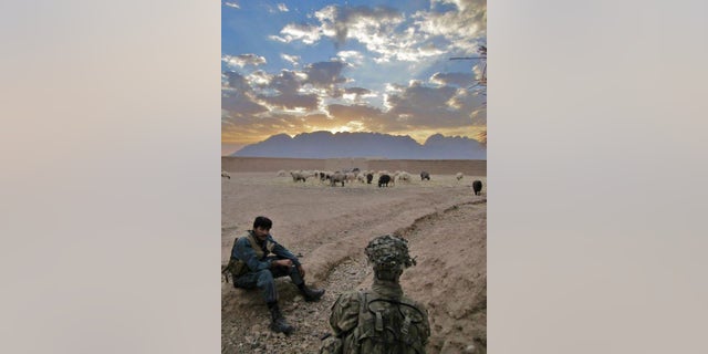 James (right) served in Afghanistan from March 2011 to March 2012