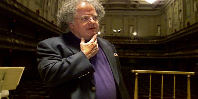 James Levine was accused of sexually harassing a minor by a former music student. Here Levine stands at the conductor's podium at Boston's Symphony Hall in 2001.