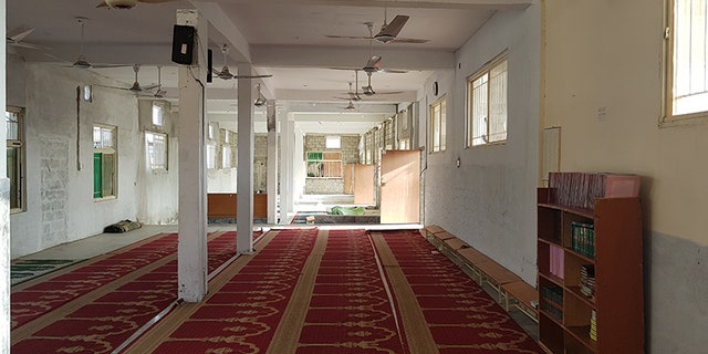 Inside Aziz's seminary.