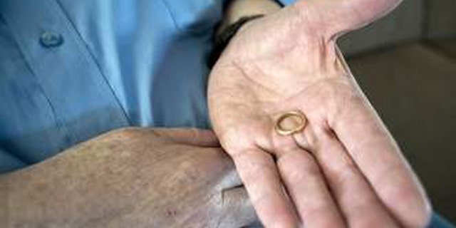 Clifford Carlson found this ring in 1994. (Angela Major/Janesville Gazette)