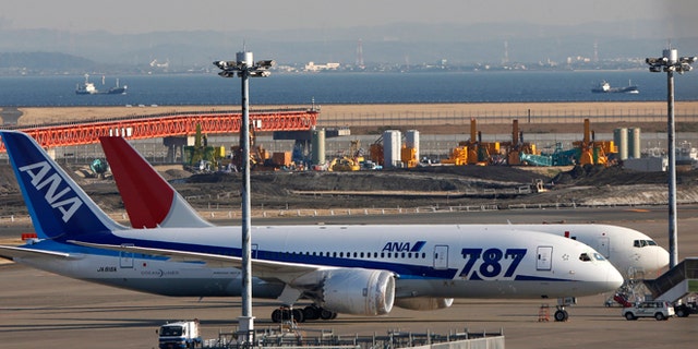 Jan. 30, 2013: An All Nippon Airways' Boeing 787 Dreamliner sits on the tarmac at Haneda Airport in Tokyo. U.S. regulators said Wednesday they asked Boeing Co. to provide a full operating history of lithium-ion batteries used in its grounded 787 Dreamliners after Japan's All Nippon Airways revealed it had repeatedly replaced the batteries even before overheating problems surfaced.