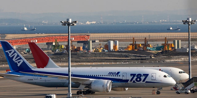 Jan. 30, 2013: An All Nippon Airways' Boeing 787 Dreamliner sits on the tarmac at Haneda Airport in Tokyo. U.S. regulators said Wednesday they asked Boeing Co. to provide a full operating history of lithium-ion batteries used in its grounded 787 Dreamliners after Japan's All Nippon Airways revealed it had repeatedly replaced the batteries even before overheating problems surfaced.