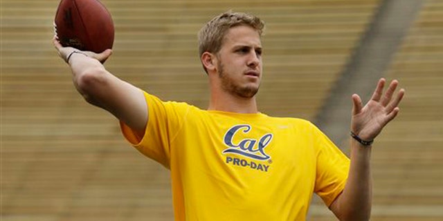 FILE - In this March 18, 2016 file photo, California quarterback Jared Goff passes during California's NFL Pro Day in Berkeley, Calif. Even in a year when the quarterbacks don't appear to be slam-dunk naturals to make it big in the NFL, that's where the focus will be when the draft begins Thursday night, April 28, in Chicago. (AP Photo/Ben Margot, File)