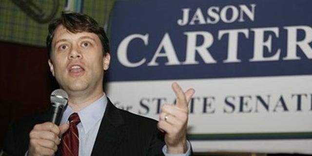 Dec. 9: Atlanta attorney Jason Carter, grandson of former President Jimmy Carter, announces his candidacy for the Georgia state Senate at a restaurant in Decatur, Ga. (AP Photos)