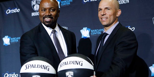 June 13, 2013: Former NBA basketball player Jason Kidd poses for photographers with Brooklyn Nets General Manager Billy King at a news conference naming Kidd as the new head coach of the Brooklyn Nets NBA basketball team in Brooklyn, N.Y.