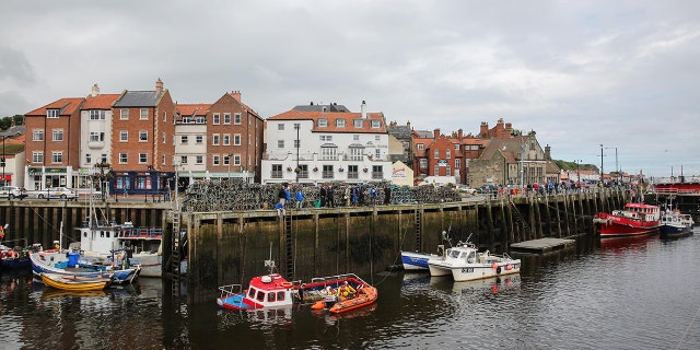 The fishermen believe the porbeagle is the first shark caught near the seaside town of Whitby.