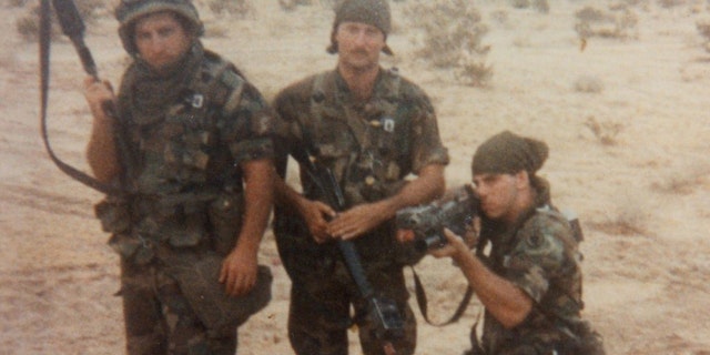 Jerry “JDog” Flanagan (kneeling) enlisted in the Army to get his life on track.