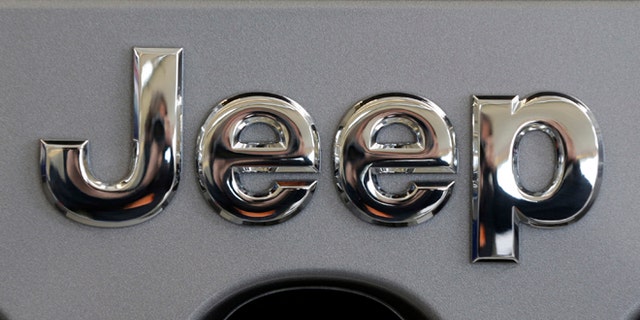 Feb. 14, 2013: A Jeep logo is shown on the grill of a Jeep Wrangler at the 2013 Pittsburgh Auto Show in Pittsburgh.