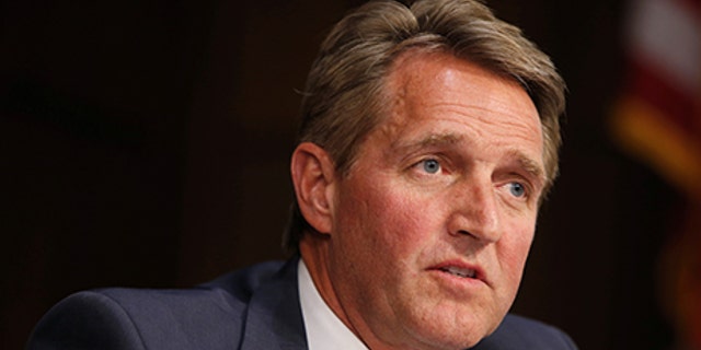 Senator Jeff Flake (R-AZ) questions Supreme Court nominee judge Neil Gorsuch during his Senate Judiciary Committee confirmation hearing on Capitol Hill in Washington, U.S., March 21, 2017. REUTERS/Joshua Roberts - RTX322MM