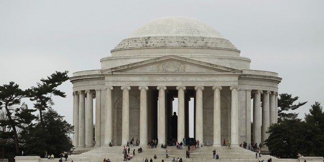 The Jefferson Memorial is seen on the Tidal Basin in Washington, March 18, 2012. REUTERS/Gary Cameron (UNITED STATES) - RTR2ZJUZ