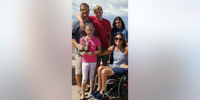 Emma Burkholder, pictured with her parents and two siblings, said it’s a small price to pay for her best friend.