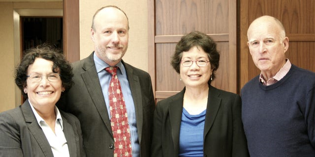 Newly appointed Cal/OSHA Chief Juliann Sum with (pictured left to right) CA Department of Industrial Relations Director Christine Baker, CA Labor and Workforce Development Agency Secretary David Lanier, and Governor Edmund G. Brown Jr.