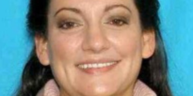 This image provided by Cannon Beach Wash. Police Department shows an undated photo of Jessica Smith, 40. A hotel housekeeper discovered an injured 13-year-old girl and the body of her 2-year-old sister at an inn on the Oregon Coast on Friday,Aug. 1, 2014 and police were searching for their mother.