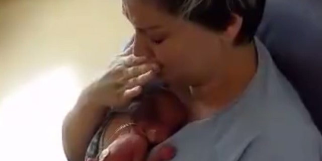 Video clip captures moment Jessica "fell completely in love with" her son, Hugo.