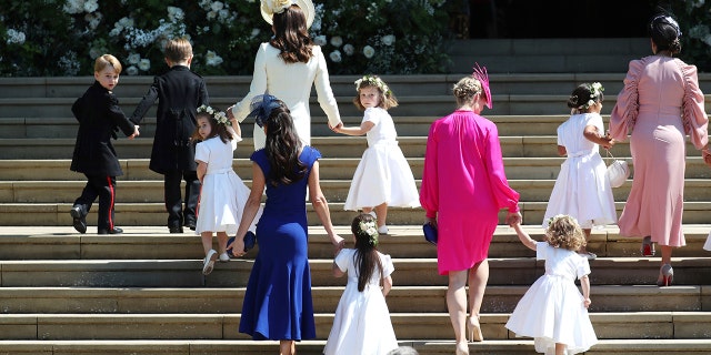 Mulroney pictured with Kate Middleton and their children who served as page boys and bridesmaids in the royal wedding.