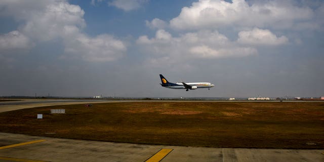 The Press Trust of India confirmed that India's civil aviation department suspended the male pilot's license for violating safety regulations by leaving the cockpit.