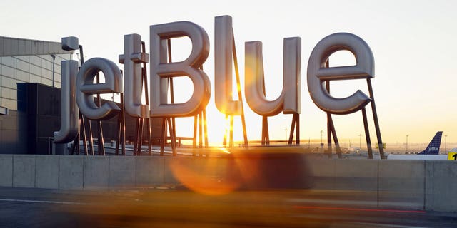 09 Nov 2011, Queens, New York City, New York State, USA --- jetBlue sign, Terminal 5, JFK terminal, New York --- Image by © Adrian Wilson/Corbis