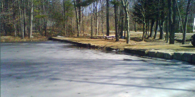 March 12, 2012: Ice partially covers the surface of Jew Pond in Mont Vernon, N.H. Residents can vote at a town meeting Tuesday whether to petition to officially change the name, which appears on a 1968 map but not on any town signs. Some say the name is inappropriate and disrespectful. Others says it was never meant to be offensive and is part of the towns history.