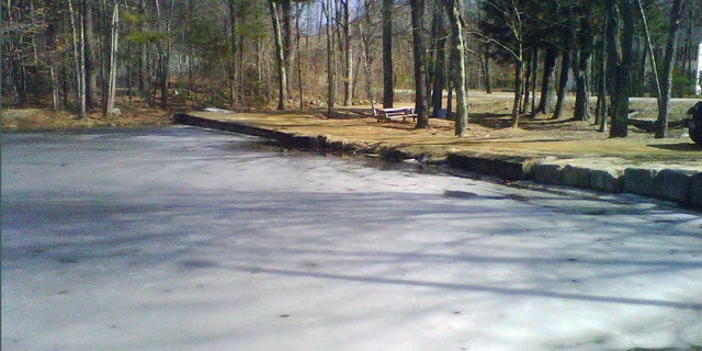 March 12, 2012: Ice partially covers the surface of Jew Pond in Mont Vernon, N.H. Residents can vote at a town meeting Tuesday whether to petition to officially change the name, which appears on a 1968 map but not on any town signs. Some say the name is inappropriate and disrespectful. Others says it was never meant to be offensive and is part of the towns history.
