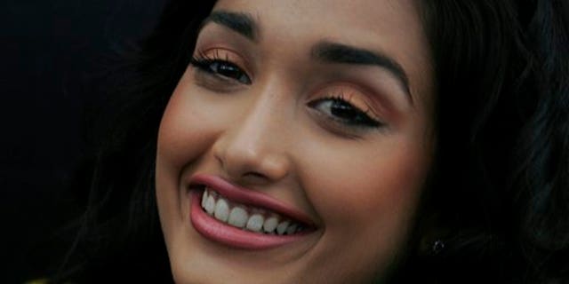 In this Dec. 19, 2008 file photo, Bollywood actress Jiah Khan smiles during a promotional event of her forthcoming Hindi movie "Ghajini" in Bangalore, India. Police said that Khan was found dead at her home in Mumbai late Monday, June 3, 2013.