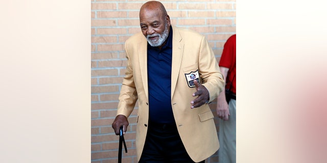 Former NFL player Jim Brown arrives for the inductions at the Pro Football Hall of Fame on Saturday, Aug. 4, 2018, in Canton, Ohio.