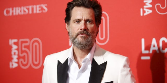 April 18, 2015. Actor Jim Carrey poses at LACMA's 50th anniversary gala in Los Angeles, California.