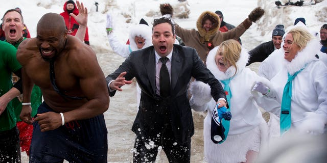 March 2, 2014. "The Tonight Show" host Jimmy Fallon, center, exits the water during the Chicago Polar Plunge. Fallon joined Chicago Mayor Rahm Emanuel in the event.