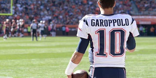 New England Patriots quaterback Jimmy Garoppolo (10) watches the action during the 2016 NFL week 5 regular season football game against the Cleveland Browns on Sunday, Oct. 9, 2016 in Cleveland. The Patriots defeated the Browns 33-13. (Jim Mahoney via AP)