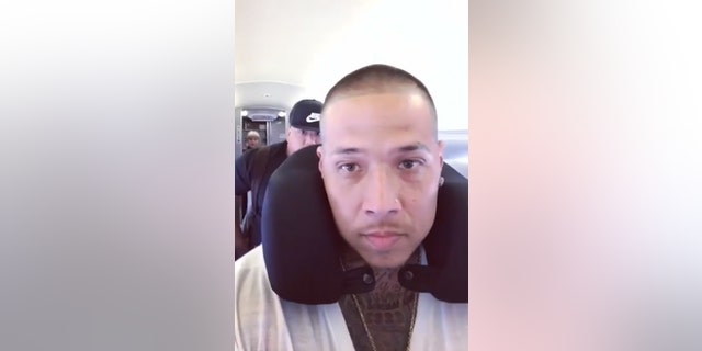 Jin Gates accused a JetBlue flight attendant of saying she didn't "feel safe" with him on the plane.