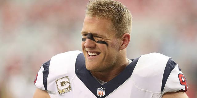 GLENDALE, AZ - NOVEMBER 10: Defensive end J.J. Watt #99 of the Houston Texans laughs during warmups for the game with the Arizona Cardinals at University of Phoenix Stadium on November 10, 2013 in Glendale, Arizona. (Photo by Stephen Dunn/Getty Images)