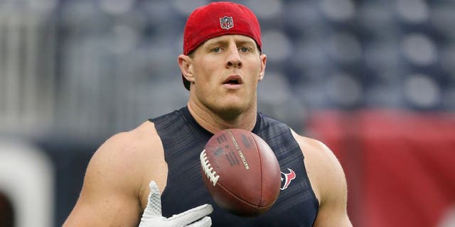HOUSTON, TX - AUGUST 15: J.J. Watt #99 of the Houston Texans warms up before the Houston Texans play the San Francisco 49ers in a preseason football game at Reliant Arena at Reliant Park on August 15, 2015 in Houston, Texas. Houston won 23-10. (Photo by Bob Levey/Getty Images)