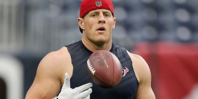 HOUSTON, TX - AUGUST 15: J.J. Watt #99 of the Houston Texans warms up before the Houston Texans play the San Francisco 49ers in a preseason football game at Reliant Arena at Reliant Park on August 15, 2015 in Houston, Texas. Houston won 23-10. (Photo by Bob Levey/Getty Images)