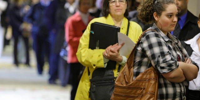 May 3, 2011: Samantha Ferrara, 19, waits in line for a job fair to open, in Independence, Ohio.