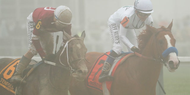 Justify ran through fog and mud during both the Kentucky Derby and the Preakness Stakes.