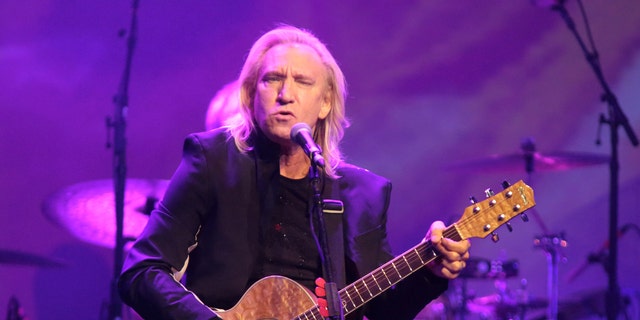 FILE - In this Oct. 12, 2015 file photo, Joe Walsh of the band The Eagles performs in a solo concert at The Fillmore in Philadelphia. Eagles keyboardist and guitarist Walsh says hes pulling out of a Cleveland summer concert he thought would be a nonpartisan event for veterans families because its actually a launch for the Republican National Convention. The concert is scheduled for July 18, 2016. (Photo by Owen Sweeney/Invision/AP, File)