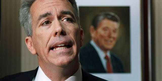In this Nov. 17, 2010 file photo, then-Rep.-elect Joe Walsh, R-Ill., speaks on Capitol Hill in Washington.