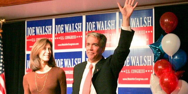 Nov. 2: Republican Joe Walsh waves to the crowd of supporters, while standing next to his wife in Wauconda, Ill. On Nov. 16, U.S. Rep. Melissa Bean conceded to Walsh on Tuesday in the tightly-fought race for her former 8th Illinois Congressional District seat.
