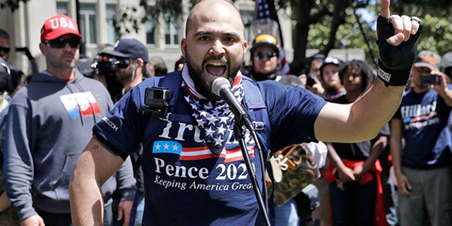 Joey Gibson speaks during a rally in support of free speech Thursday, April 27, 2017, in Berkeley, Calif. Demonstrators gathered near the University of California, Berkeley campus