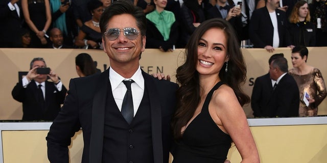 John Stamos's fiancee, Caitlin McHugh, was reportedly robbed just days before their wedding.