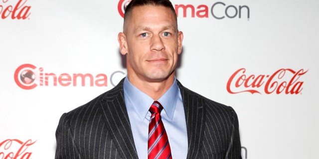 John Cena, recipient of the Action Star of the Year Award, poses on the red carpet during CinemaCon, a convention of movie theater owners, in Las Vegas, Nevada, U.S., March 30, 2017. Picture taken March 30, 2017. REUTERS/Steve Marcus - RTX33HJQ