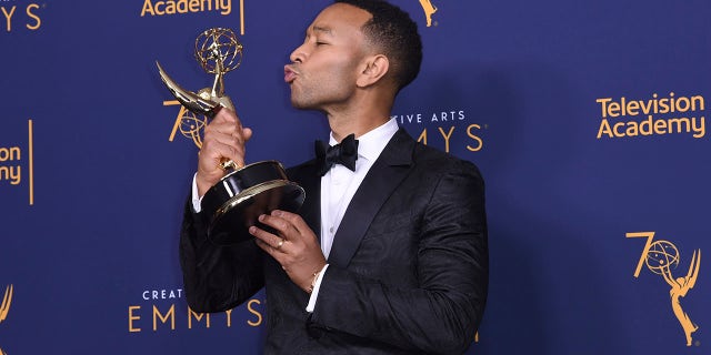 John Legend, winner of the award for outstanding variety special for "Jesus Christ Superstar Live in Concert," poses in the press room during Night 2 of the Creative Arts Emmy Awards at The Microsoft Theater on Sunday, Sept. 9, 2018, in Los Angeles. (Photo by Richard Shotwell/Invision/AP)