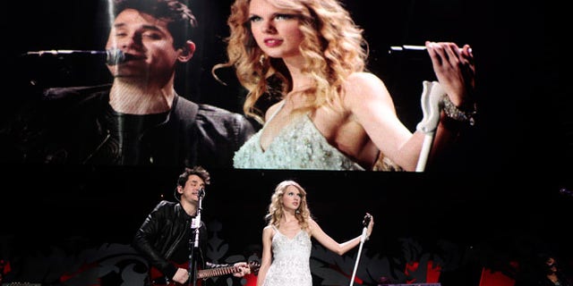 Happier times: Mayer and Swift performed together in 2009.