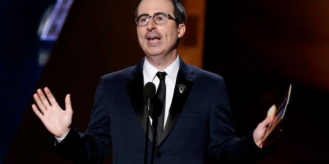 John Oliver tackled the Dustin Hoffman assault rumors during a live Q&A, but did not receive answers. Here Oliver presents an award at the 67th Annual Emmy Awards in Los Angeles, September 2015