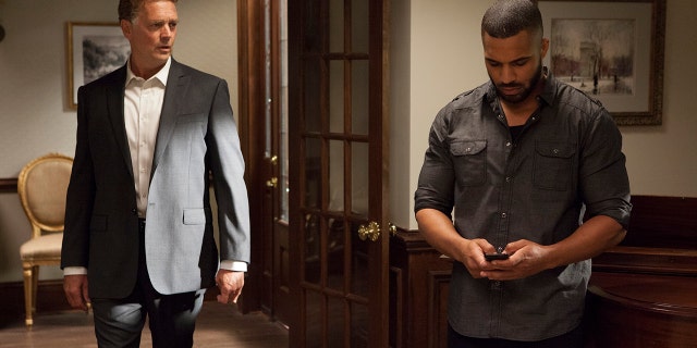 John Schneider, left, and Tyler Lepley in a scene from Season 4 of Tyler Perry's "The Haves and the Have Nots."