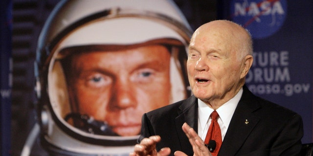 In this Feb. 20, 2012, file photo, Sen. John Glenn talks with astronauts on the International Space Station via satellite before a discussion titled "Learning from the Past to Innovate for the Future" in Columbus, Ohio. 