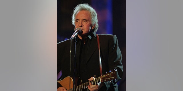 Sept. 2, 1995. Johnny Cash performs during his segment of the Concert for the Rock and Roll Hall of Fame in Cleveland.