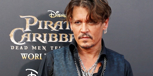 Johnny Depp revealed that he is enjoying being out of the spotlight.